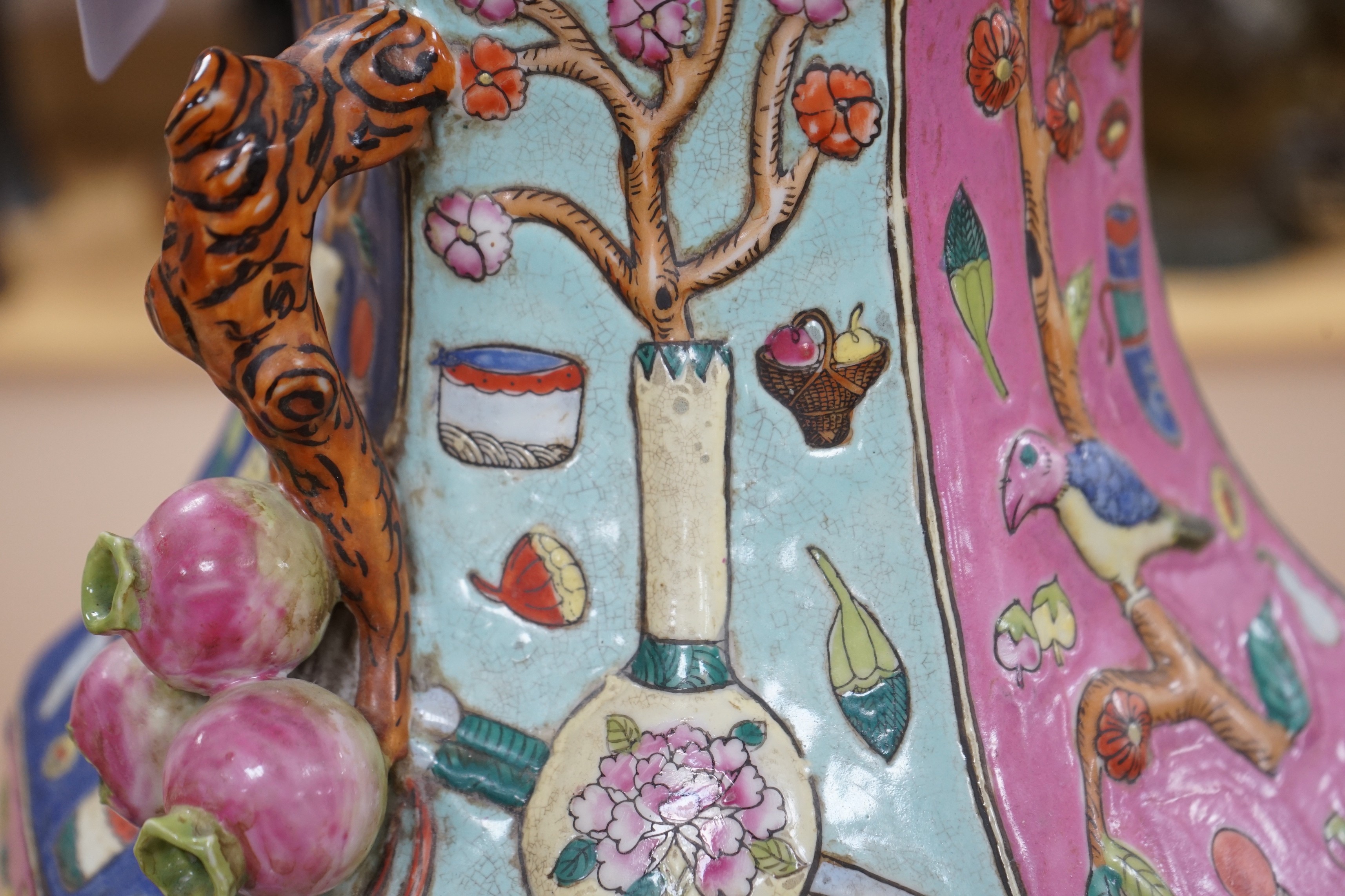 A large Chinese famille rose two handled hexagonal vase. 64cm tall